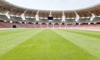 أرضية ملعب وهران الجديد تستعيد اخضرارها