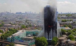 الشرطة البريطانية ترجح مقتل 79 شخصا في حريق البرج السكني في لندن