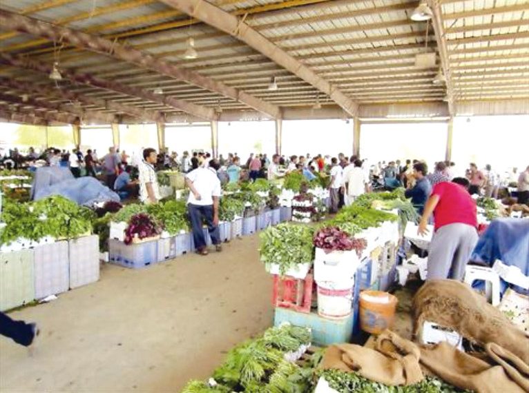 سـوق الجملــة بالكرمــة.. قلــب وهــران النّابـض